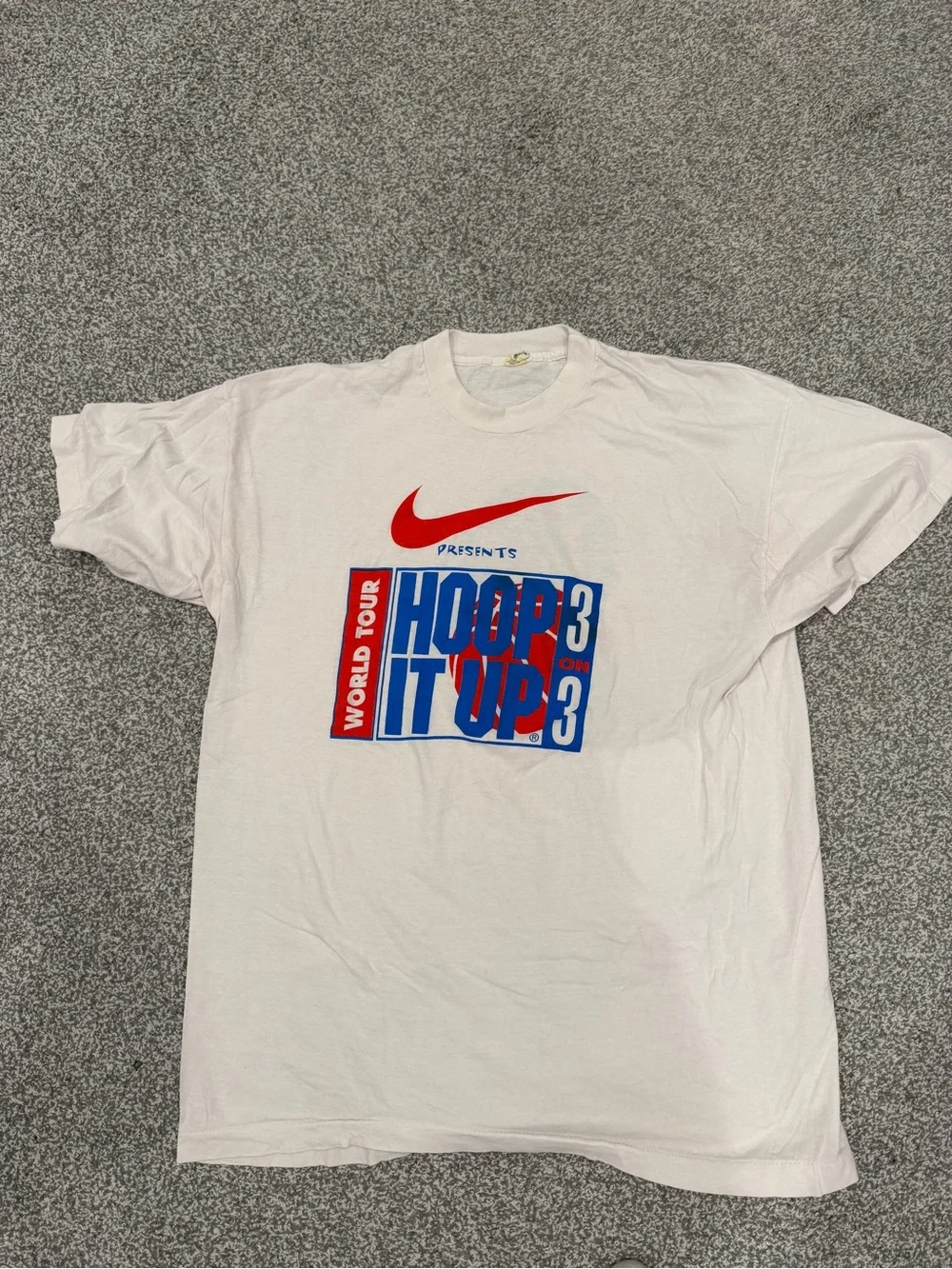 Nike White Graphic Tee with Red Swoosh and Blue/Red Hoop It Up Print